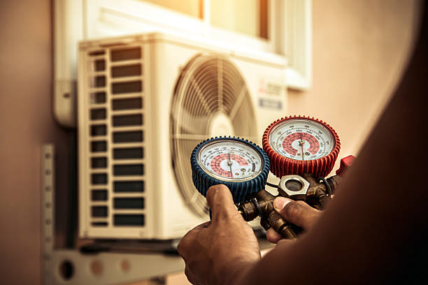 Professional Ductwork Repair technician working in Mystic, CT